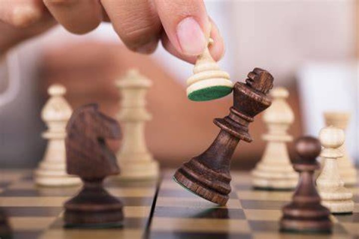 Can you touch a piece in chess without moving it?