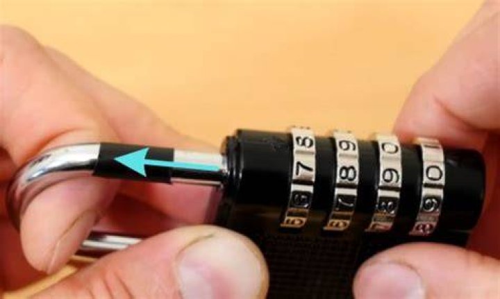 How do you open a 4 digit lock box?