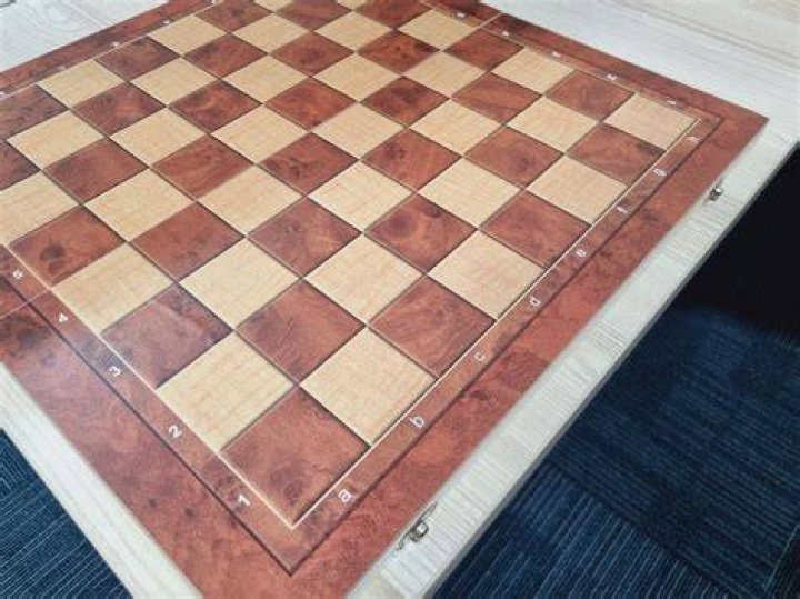 How do you paint a checker board on a table?