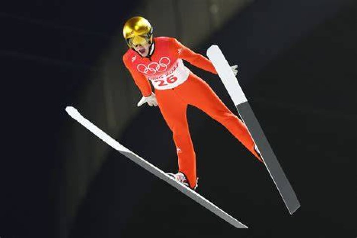 How high is highest hill in Olympic ski jumping?