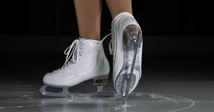 In which sport do the skaters use longer blades on their boots?