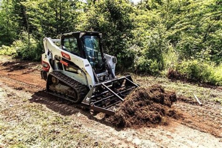 Is a skid steer good for clearing land?