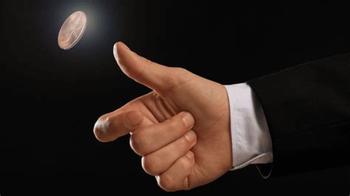 What does flipping a coin symbolize?