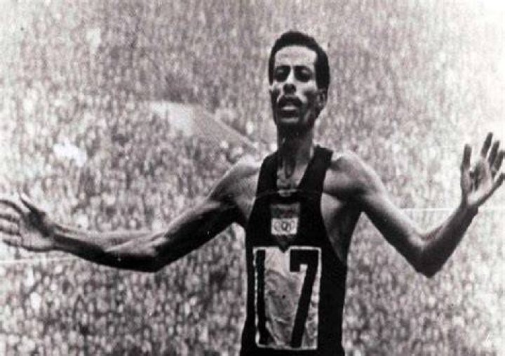 Who was the first black African to win a gold medal in the Olympics?
